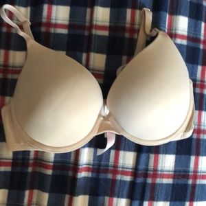 Slightly used tan Victoria secret bra